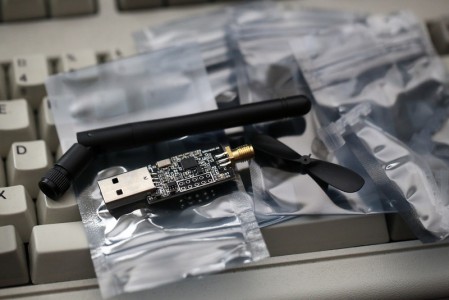 The USB radio dongle, antenna and one of the propellers.